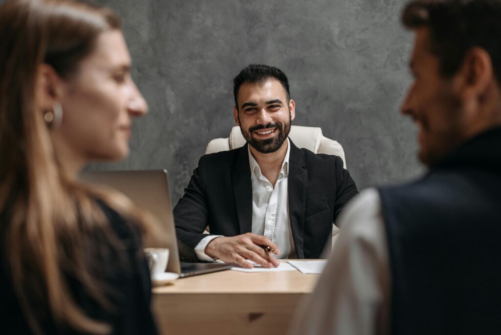 Colleagues having a discussion in the office.