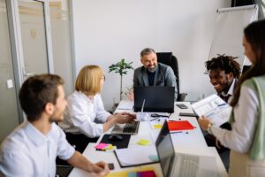 People in a meeting room.